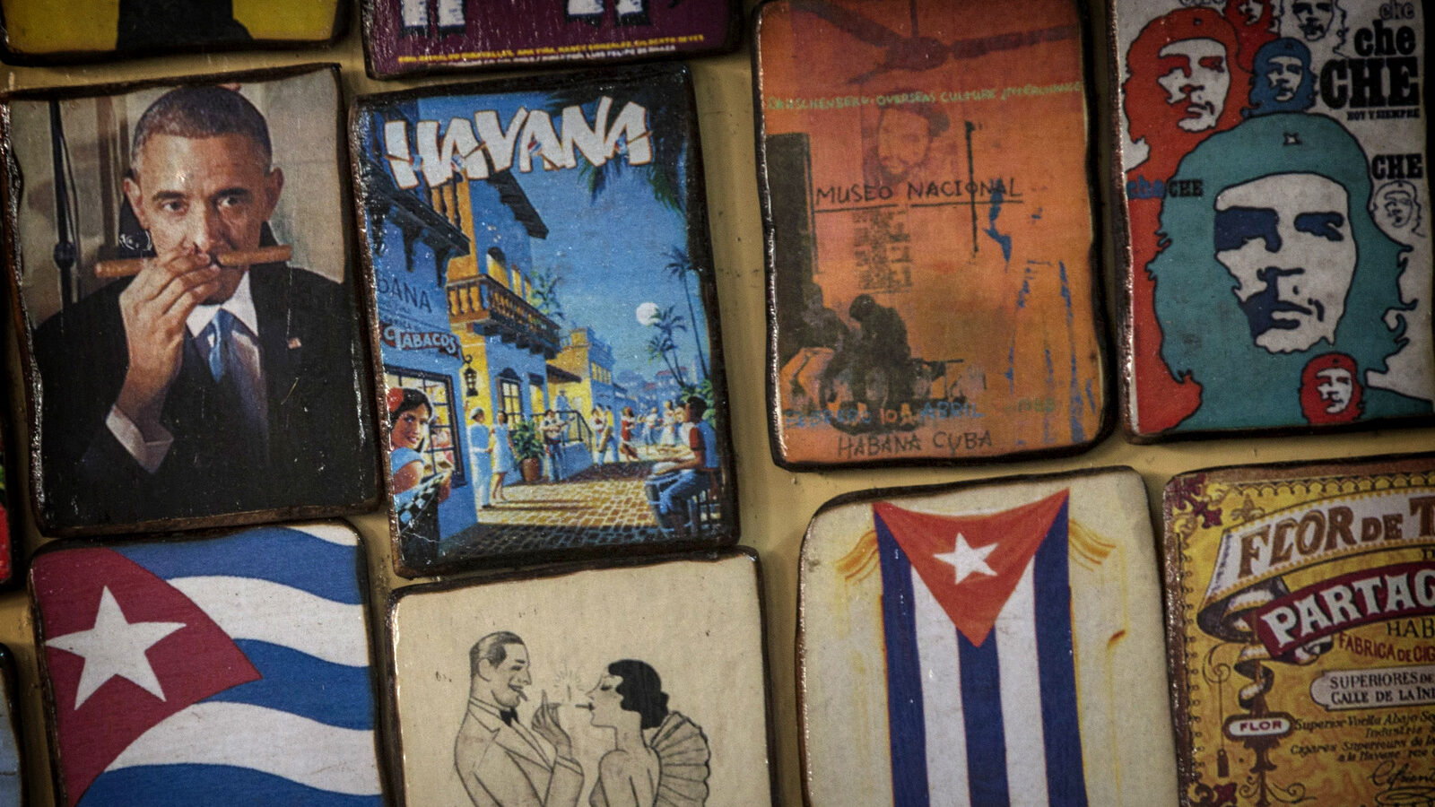 Magnets for sale decorate a tourist shop, one showing an image of U.S. President Barack Obama smelling a cigar, at a market in Havana, Cuba, Monday, March 16, 2015. (AP/Ramon Espinosa)