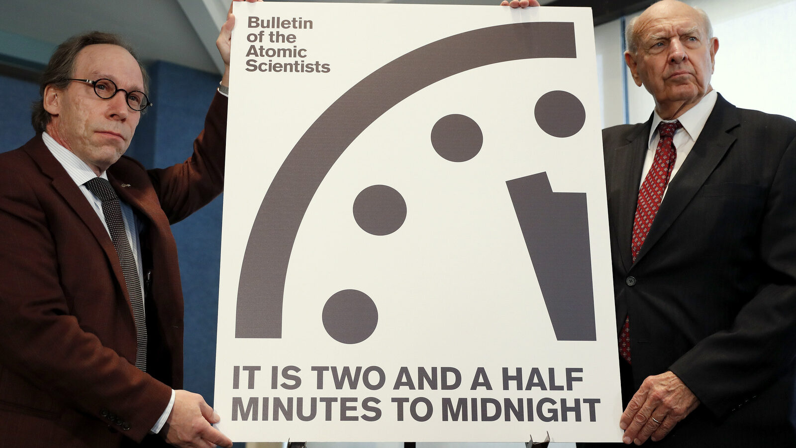 Lawrence Krauss, theoretical physicist, chair of the Bulletin of the Atomic Scientists Board of Sponsors, left, and Thomas Pickering, co-chair of the International Crisis Group, display the Doomsday Clock during a news conference the at the National Press Club in Washington, Thursday, Jan. 26, 2017, announcing that the Bulletin of the Atomic Scientist have moved the minute hand of the Doomsday Clock to two and a half minutes to midnight. (AP Photo/Carolyn Kaster)