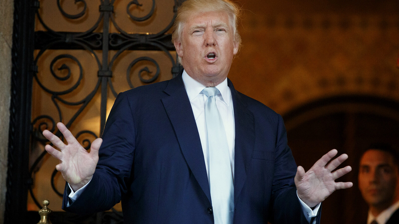 Donald Trump speaks to reporters at Mar-a-Lago in Palm Beach, Fla. Trump challenges U.S. intelligence agencies to provide decisive evidence of Russian involvement in election-season hacking. (AP/Evan Vucci)