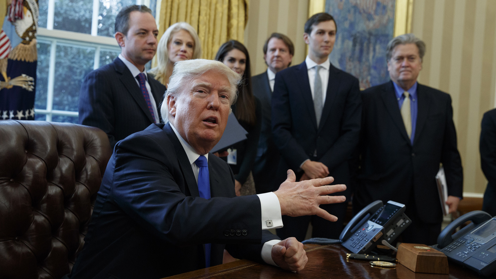 President Donald Trump talks with reporters n the Oval Office of the White House in Washington, Tuesday, Jan. 24, 2017, before signing an executive order on the Keystone XL pipeline. (AP/Evan Vucci)