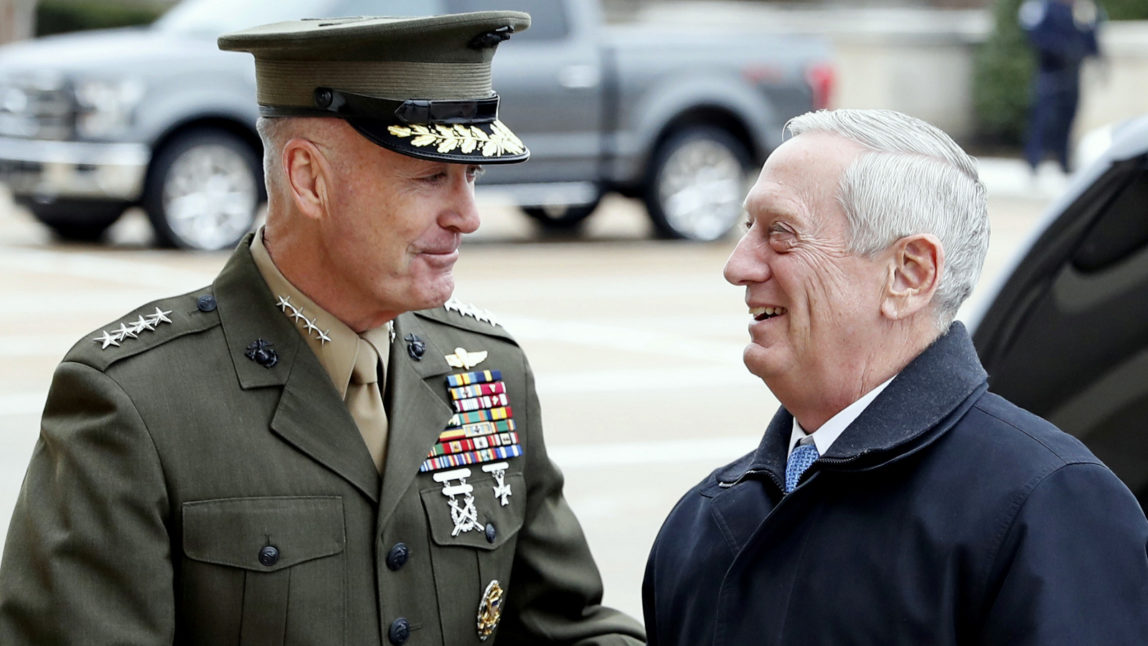 Joint Chiefs Chairman Gen. Joseph Dunford greets Defense Secretary James Mattis at the Pentagon (AP/Alex Brandon)