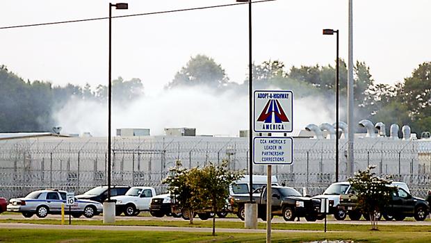 Smoke rises above the Adams County Correctional Center in Natchez, Miss., May 20, 2012, during an inmate disturbance at the prison. (PHoto: AP/The Natchez Democrat)