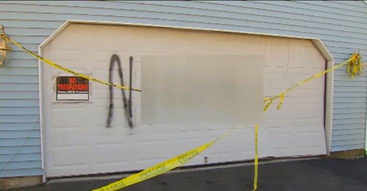 Racist graffiti left on an interracial couples home.