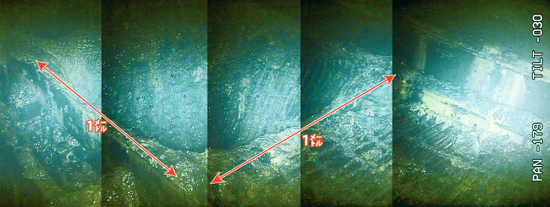 A nearly 1-square-meter hole is seen in a walkway in the containment vessel of the No. 2 reactor at Fukushima No. 1 nuclear plant. It is thought that the heat of the melted nuclear fuel caused the walkway to give way. (Photo: TEPCO)