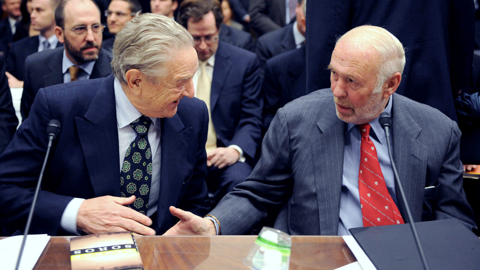 Soros Fund Management chairman George Soros, left, shakes hands with Renaissance Technologies President James Simons on Capitol Hill in Washington, Thursday, Nov. 13, 2008, prior to testifying before the House Oversight and Government Reform Committee hearing on "Hedge Funds and the Financial Market". (AP/Kevin Wolf)