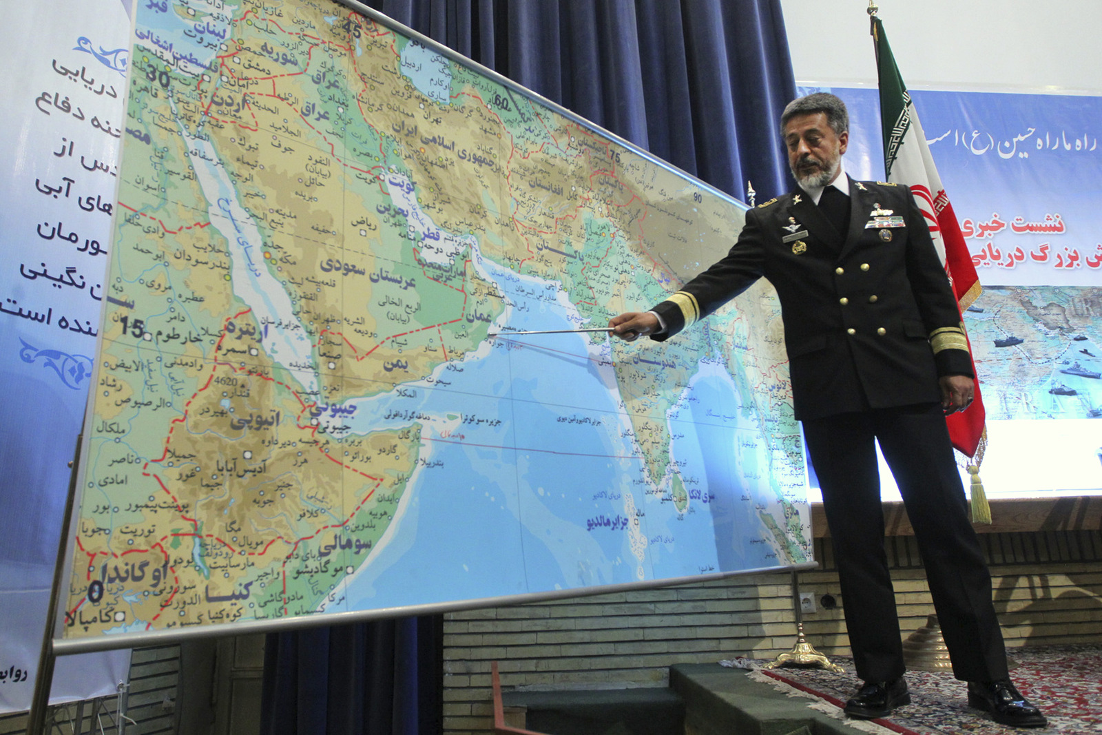 Iran's navy chief Adm. Habibollah Sayyari briefs media on an upcoming naval exercise, in a press conference in Tehran, Iran, Thursday, Dec. 22, 2011. Sayyari said Thursday his forces plan to hold a 10-day drill in international waters beyond the strategic Strait of Hormuz at the mouth of the Persian Gulf _ an exercise that could bring Iranian ships into proximity with U.S. Navy vessels. (AP/Fars News Agency, Hamed Jafarnejad)