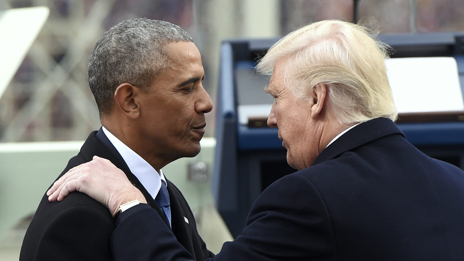 President Barack Obama speaks with President-elect Donald Trump during the presidential inauguration at the U.S. Capitol in Washington, Friday, Jan 20, 2017. (Saul Loeb/AP)