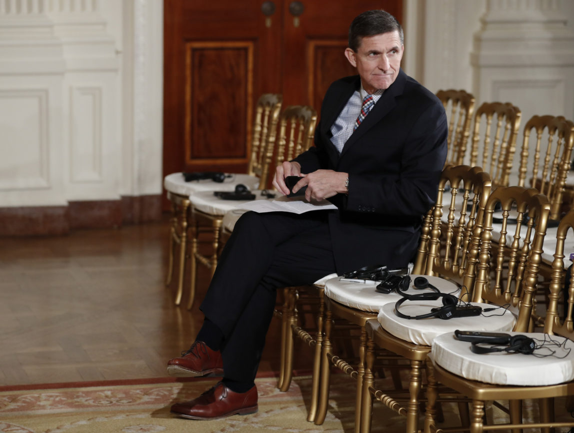 Michael Flynn sits in the front row before the start of the President Donald Trump and Japanese Prime Minister Shinzo Abe joint new conference in the East Room of the White House, in Washington, Friday, Feb. 10, 2017. (AP/Carolyn Kaster)