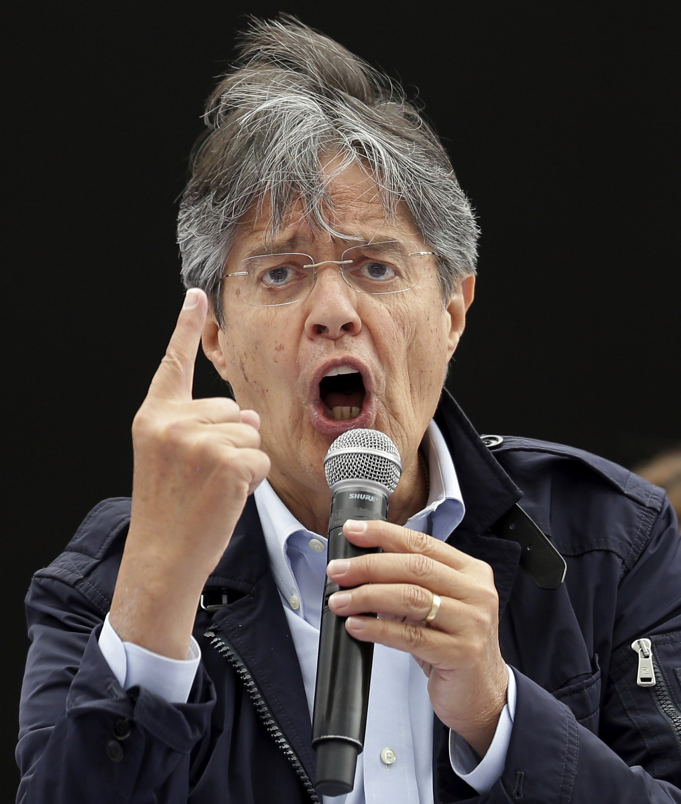 Guillermo Lasso, presidential candidate for the party Creando Oportunidades, CREO, speaks to supporters during a campaign event in Quito, Ecuador, Wednesday, Feb. 15, 2017.(AP/Dolores Ochoa)