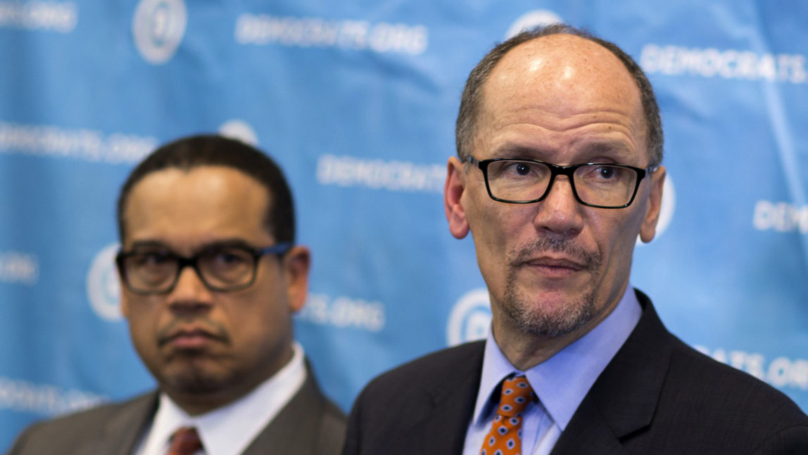 Newly elected Democratic National Committee Chairman Tom Perez, right, and Rep. Keith Ellison, D-Minn., who was named deputy chairman, listen to a question from the media during a press conference at the DNC winter meeting in Atlanta, Saturday, Feb. 25, 2017. (AP/Branden Camp)