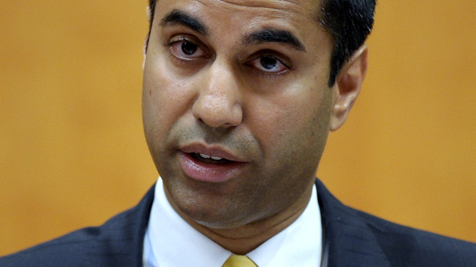 FCC commissioner Ajit Pai presents his dissent during a Federal Communications Commission (FCC) hearing at the FCC in Washington. (AP/Susan Walsh)