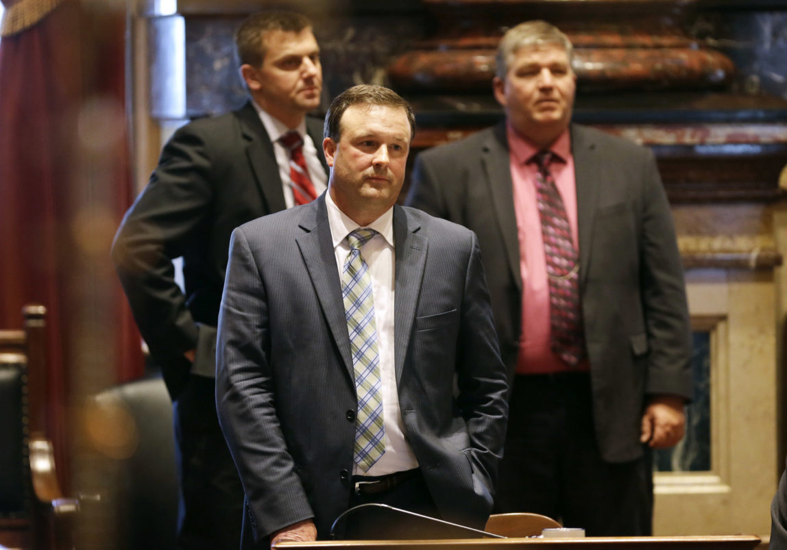 Iowa Senate Minority Leader Bill Dix, R-Shell Rock, center, looks on as Iowa Senate Majority Leader Michael Gronstal speaks on the floor of the Senate at the Statehouse in Des Moines, Iowa. (AP/Charlie Neibergall,)