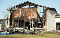 The FBI, ATF and other agencies sift through the burned remains of the Victoria Islamic Center a mosque in Victoria on Jan. 29 2017. Bob Daemmrich for The Texas Tribune
