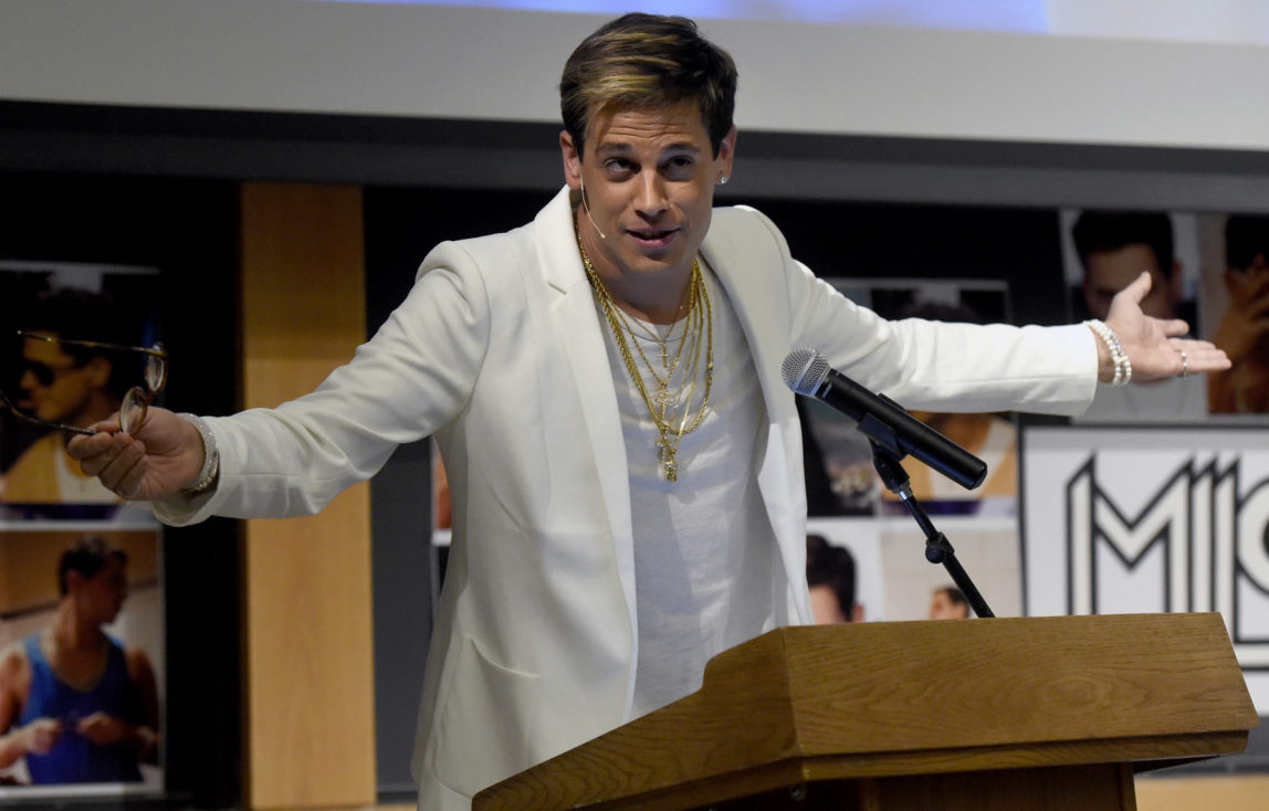 Milo Yiannopoulos speaks on campus in the Mathematics building at the University of Colorado in Boulder, Colo. Right-wing provocateur Yiannopoulos was trying to clarify past comments on relationships between boys and older men after a conservative site posted a collection of edited video clips that set social media abuzz. After the polarizing Breitbart News editor was invited this weekend to speak at the annual Conservative Political Action Conference sparked a backlash, the Reagan Battalion tweeted video clips Sunday, Feb. 19, 2017 in which Yiannopoulos discusses Jews, sexual consent, statutory rape, child abuse and homosexuality. (Jeremy Papasso/Daily Camera via AP, File)