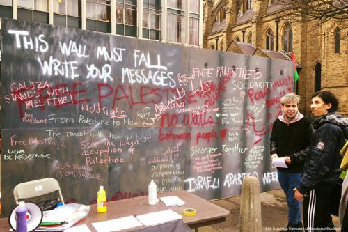 Image of a mock apartheid wall by the student-led BDS campaign at the University of Manchester on 3 March 2017 [BDS Campaign University of Manchester/Facebook]