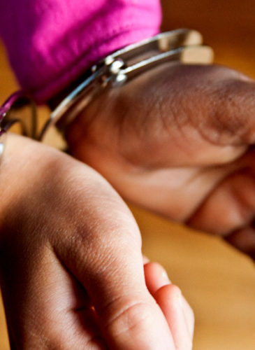 School student handcuffed jail prison youth education