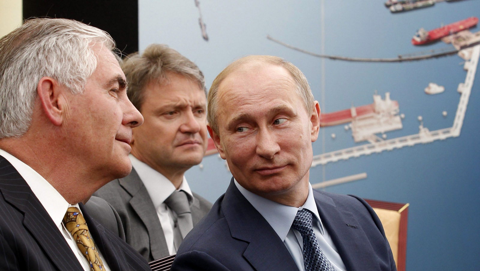 Russian President Vladimir Putin, right, and Exxon Mobil Corp. CEO Rex Tillerson, left, attend a signing ceremony of an agreement between state-controlled Russian oil company Rosneft and Exxon Mobil corporation at the Black Sea port of Tuapse, Russia, June 15, 2012. (AP/RIA-Novosti, Mikhail Klimentyev)