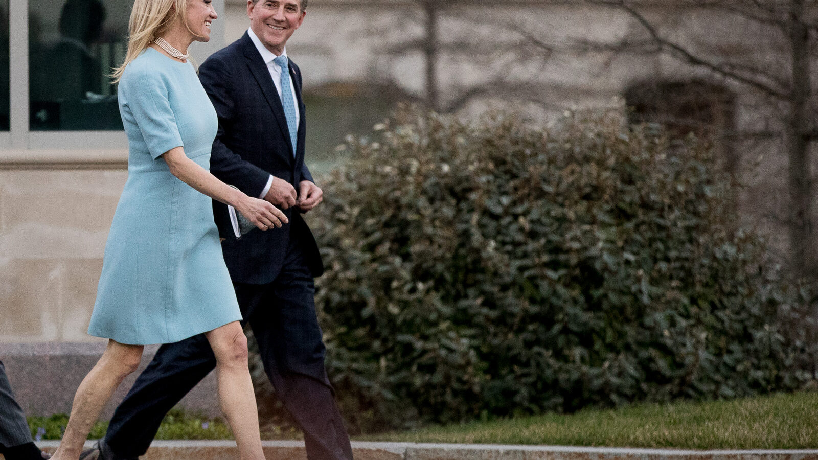 Counselor to the President Kellyanne Conway, right, and Former Sen. Jim DeMint of the Heritage Foundation, left, walk away from the West Wing of the White House, Wednesday, March 8, 2017, in Washington. (AP/Andrew Harnik)