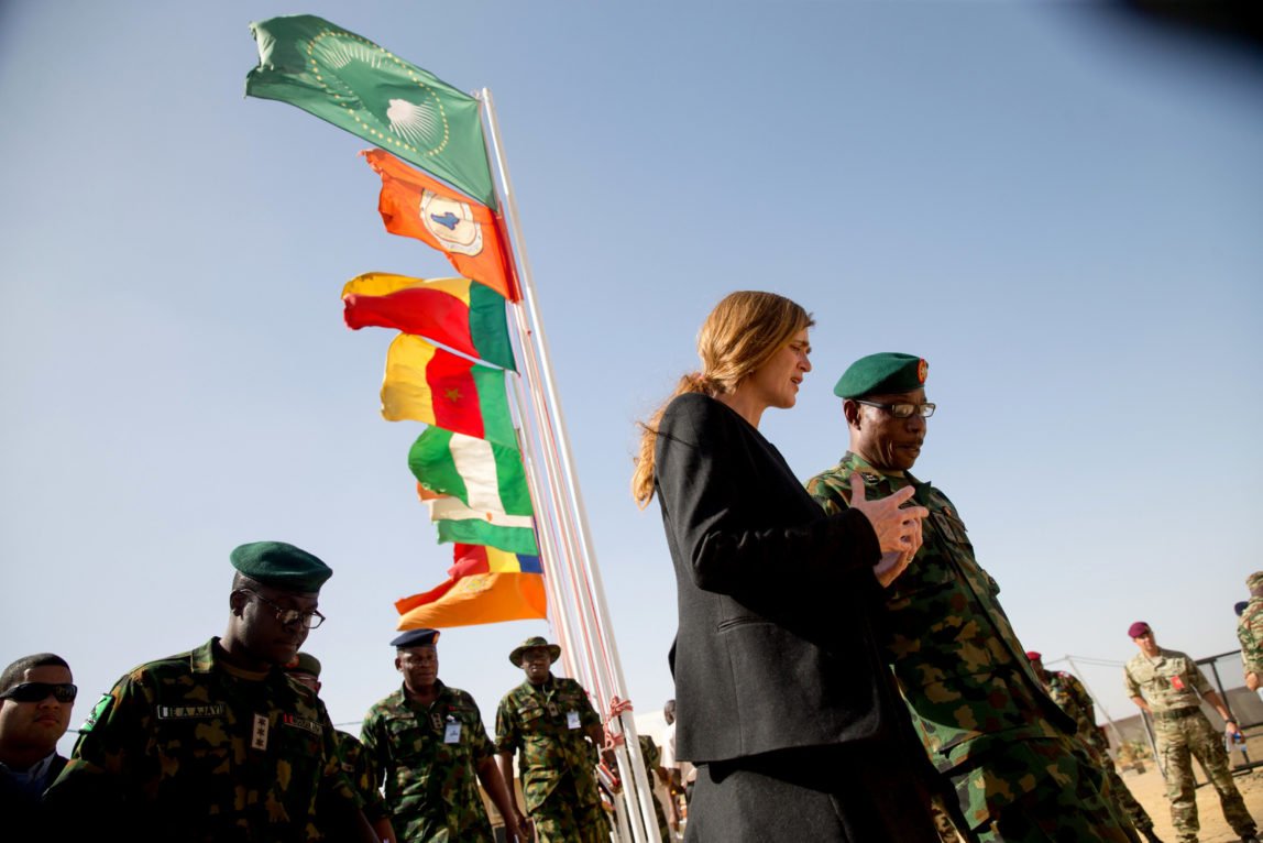 Former U.S. Ambassador to the United Nations Samantha Power speaks with Multinational Joint Task Force Commander Maj. Gen. Lamidi Adeosun, right, as she departs their headquarters in N'Djamena, Chad,, April 20, 2016. (AP/Andrew Harnik)