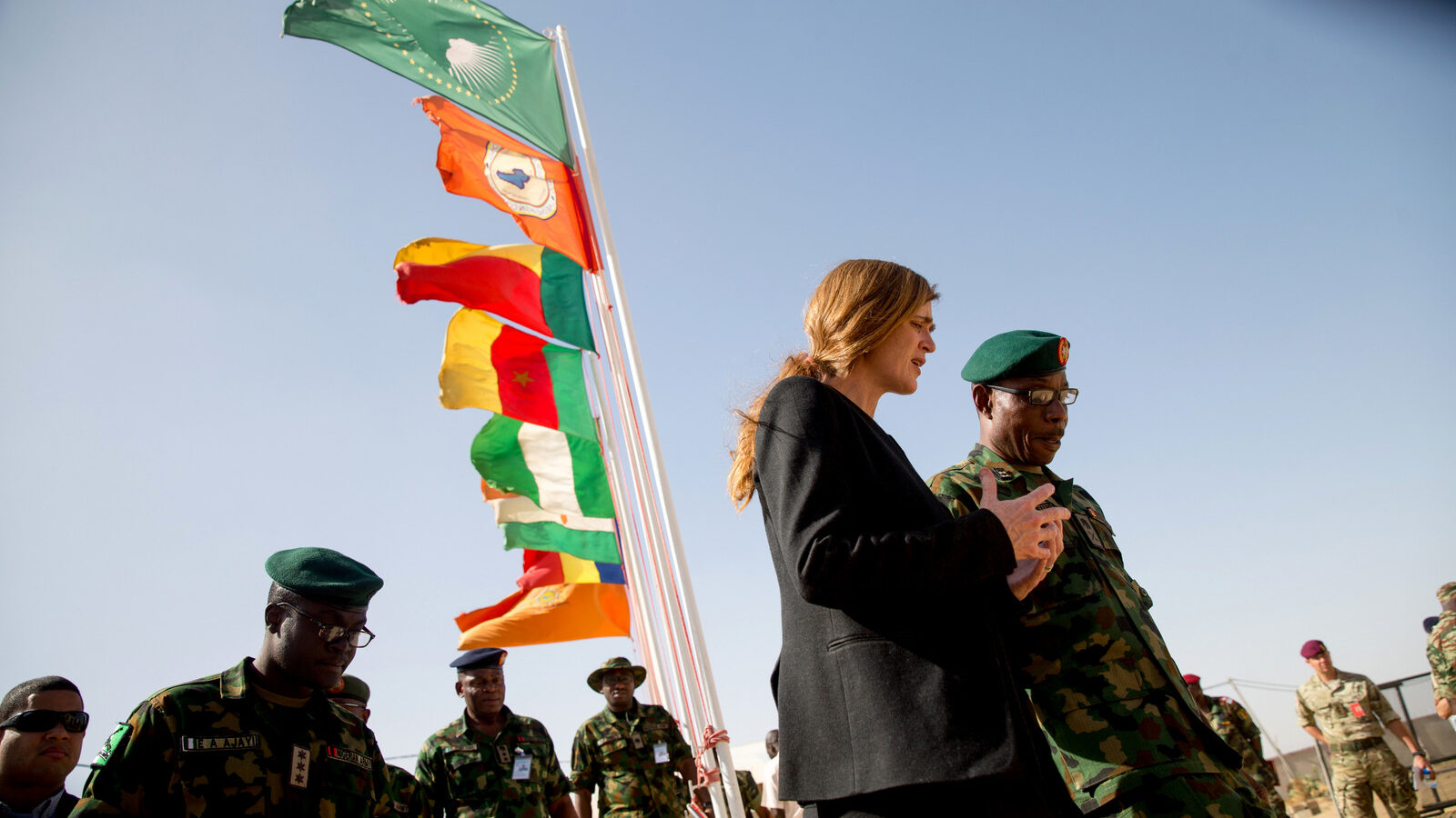 Former U.S. Ambassador to the United Nations Samantha Power speaks with Multinational Joint Task Force Commander Maj. Gen. Lamidi Adeosun, right, as she departs their headquarters in N'Djamena, Chad,, April 20, 2016. (AP/Andrew Harnik)