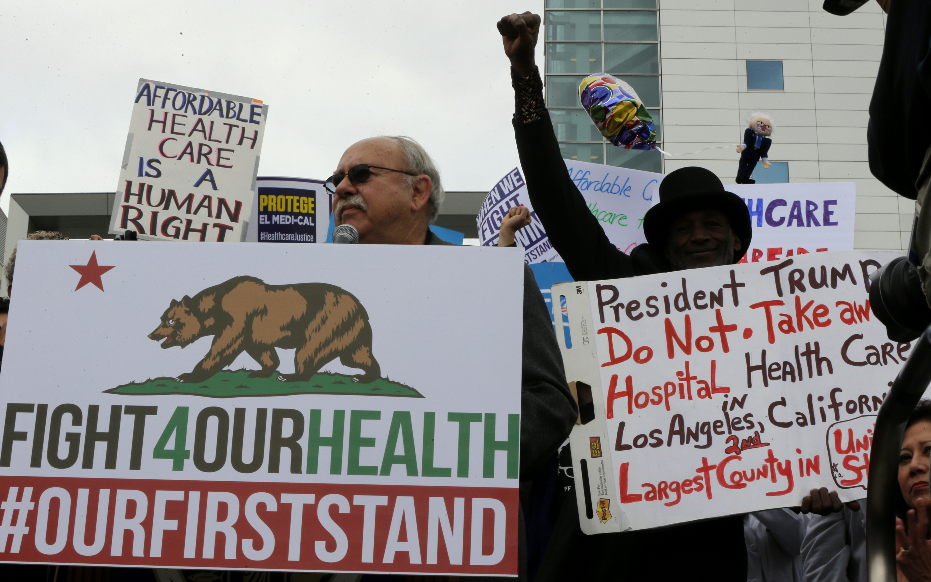 A rally against Republicans proposed changes health care changes in AC+USC Medical Center in Los Angeles Sunday, Jan. 15, 2017. (AP/Damian Dovarganes)