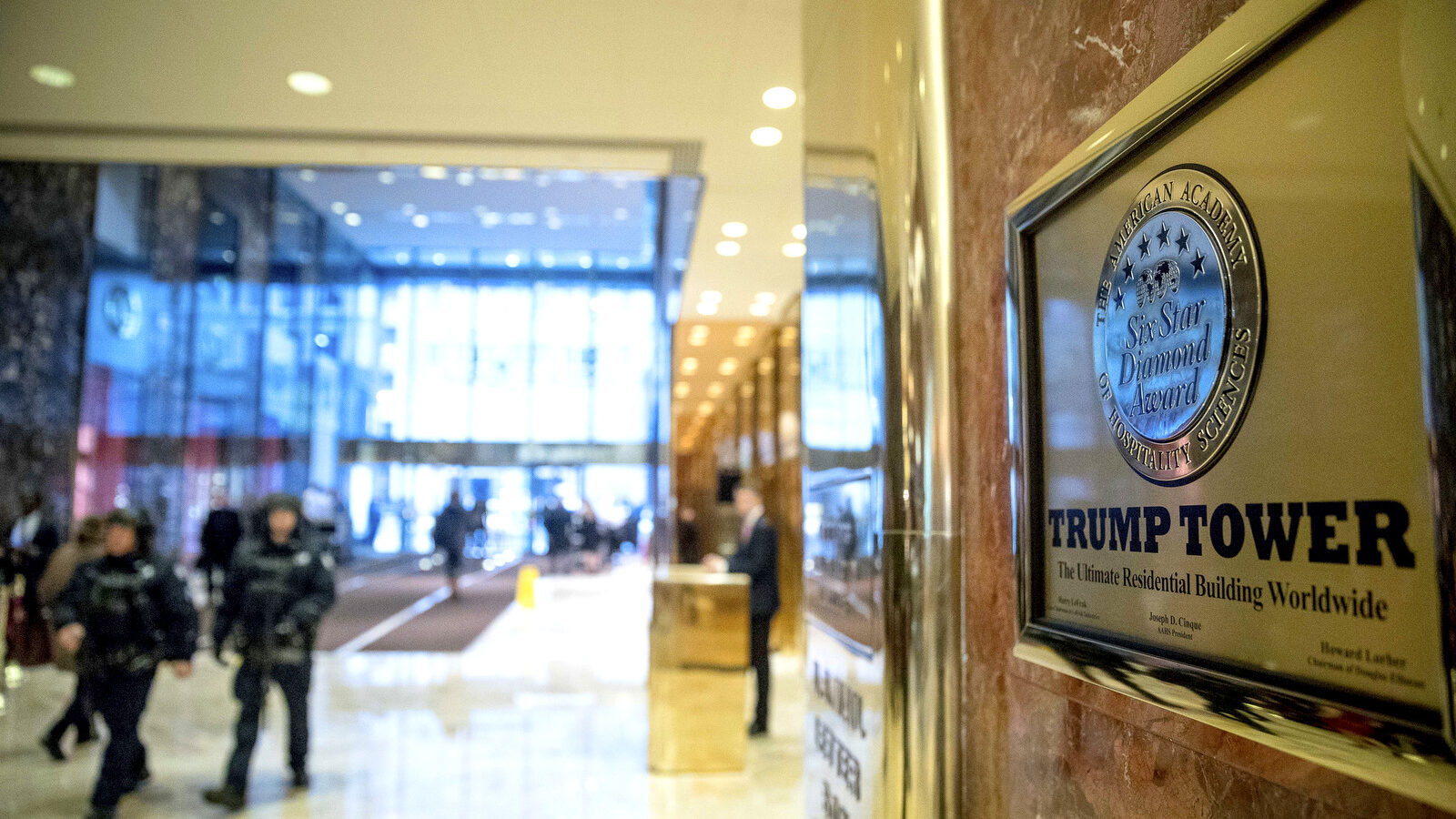 Armored police walk through the lobby of Trump Tower in New York. (AP/Andrew Harnik)