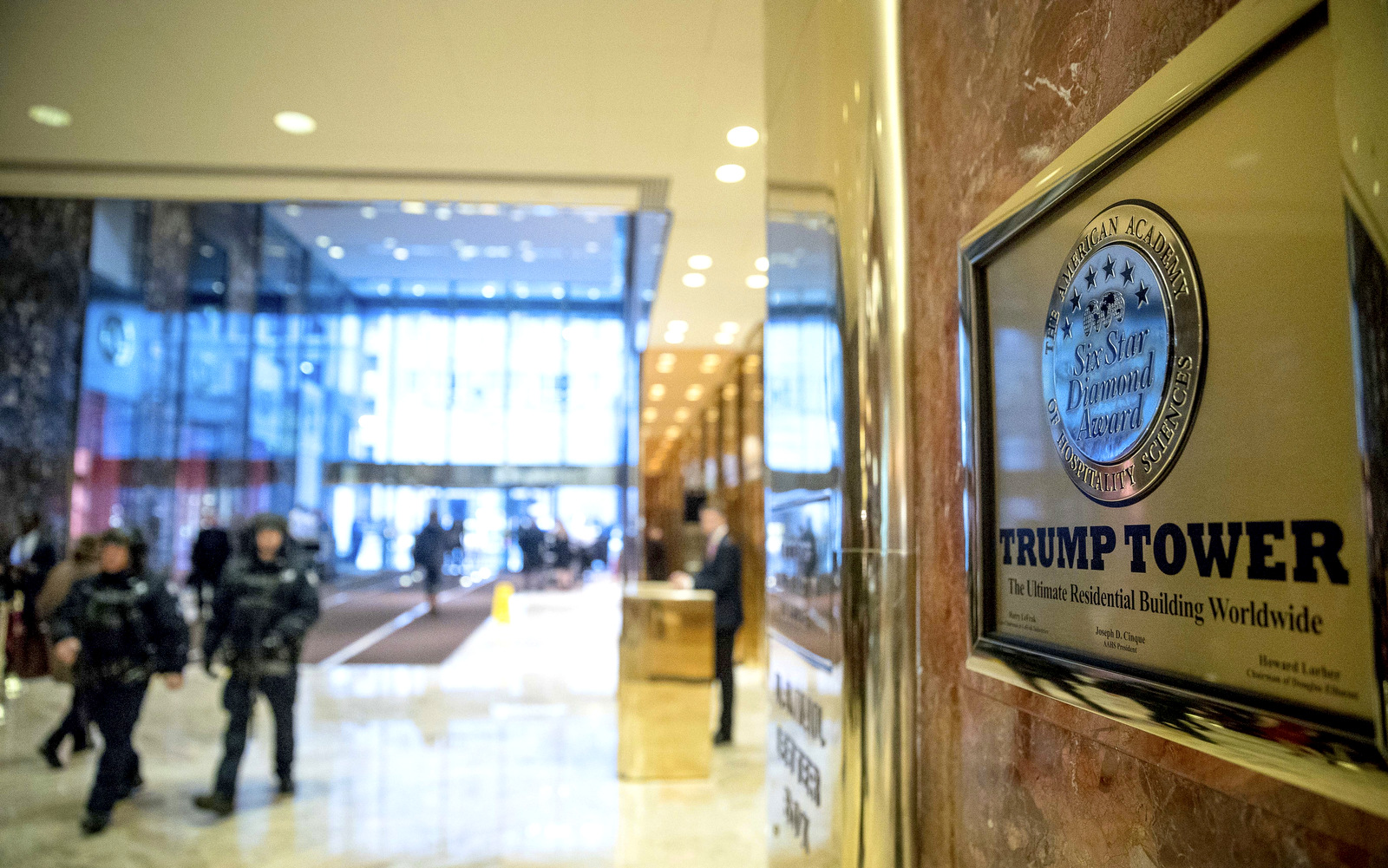 Armored police walk through the lobby of Trump Tower in New York. (AP/Andrew Harnik)