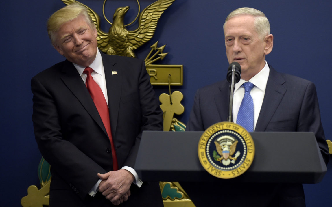 Donald Trump, left, listens as Defense Secretary James Mattis, right, speaks at the Pentagon in Washington. (AP/Susan Walsh)