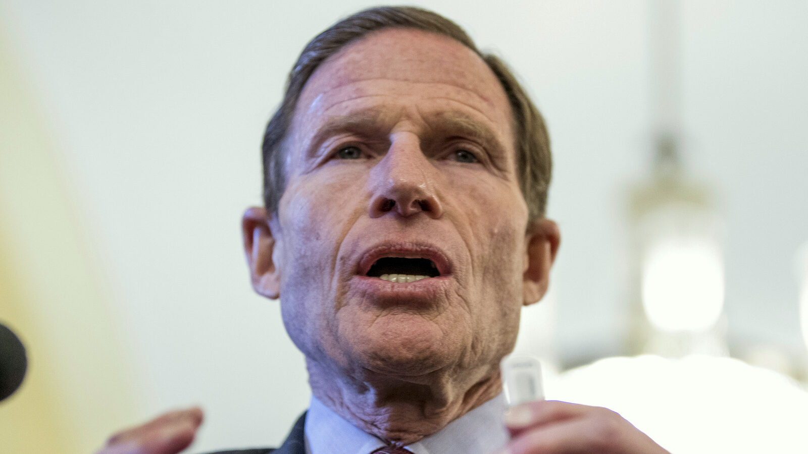 Sen. Richard Blumenthal, D-Conn. holds a thumb drive during a news conference on Capitol Hill in Washington, Tuesday, Feb. 7, 2017, with petitions calling for the Senate to reject Attorney General-designate Sen. Jeff Sessions, R-Ala. (AP/Andrew Harnik)