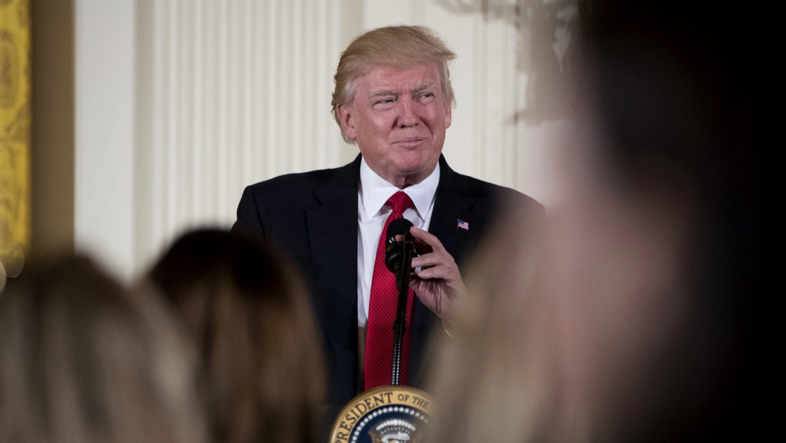 Trump pauses while speaking in the East Room of the White House in Washington. (AP/Andrew Harnik)