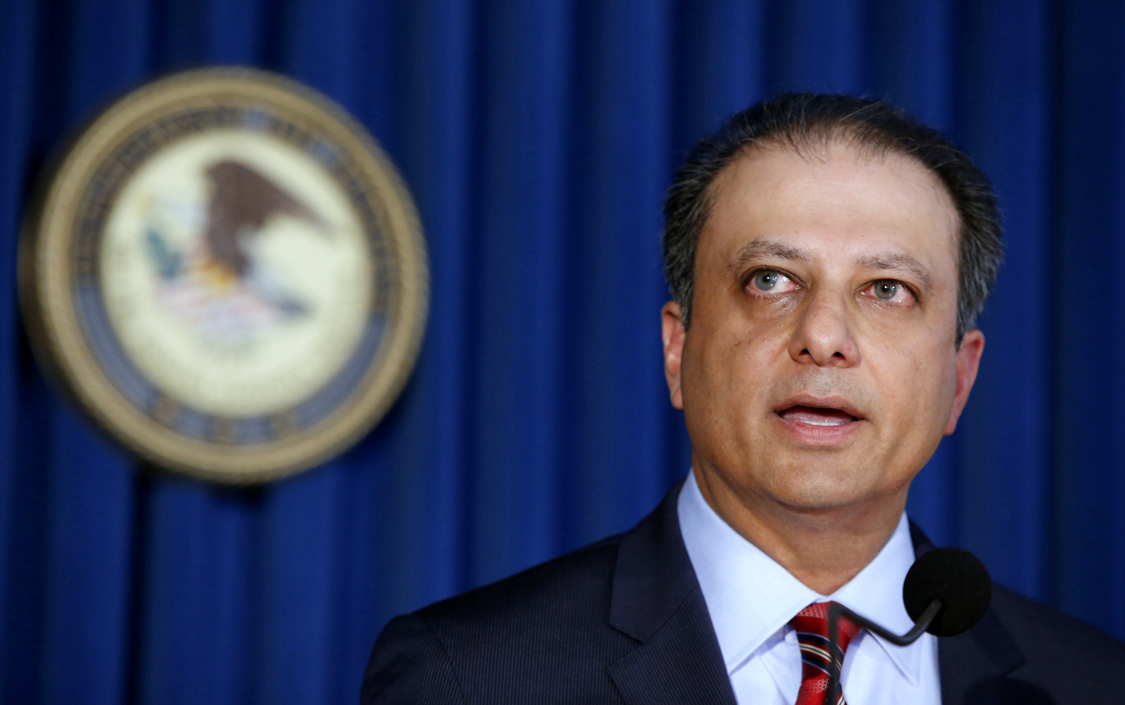 U.S. Attorney Preet Bharara speaks during a news conference in New York.  On Wednesday, March 8, 2017, two days before Attorney General Jeff Sessions gave dozens of the country's top federal prosecutors just hours to resign and clean out their desks. Bharara said on Saturday, March 11, 2017, that he was fired after refusing to resign. (AP/Kathy Willens)