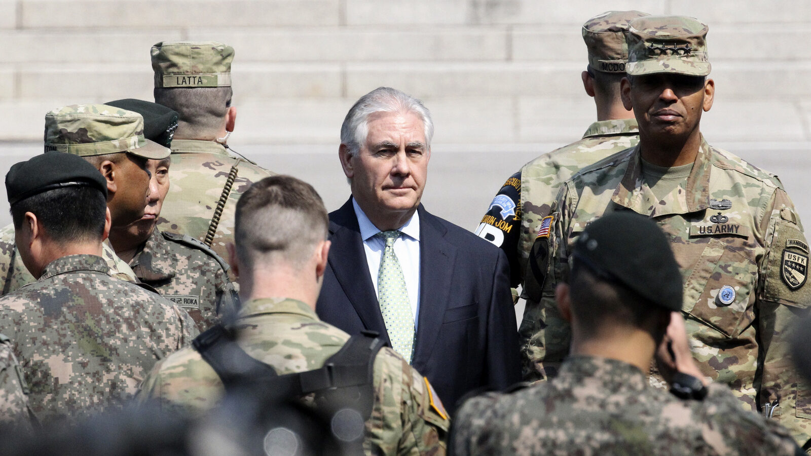 U.S. Secretary of State Rex Tillerson, center, visits with U.S. Gen. Vincent K. Brooks, commander of the United Nations Command, Combined Forces Command and United States Forces Korea, right, at the border village of Panmunjom, which has separated the two Koreas since the Korean War, South Korea, Friday, March 17, 2017. (AP/Lee Jin-man)