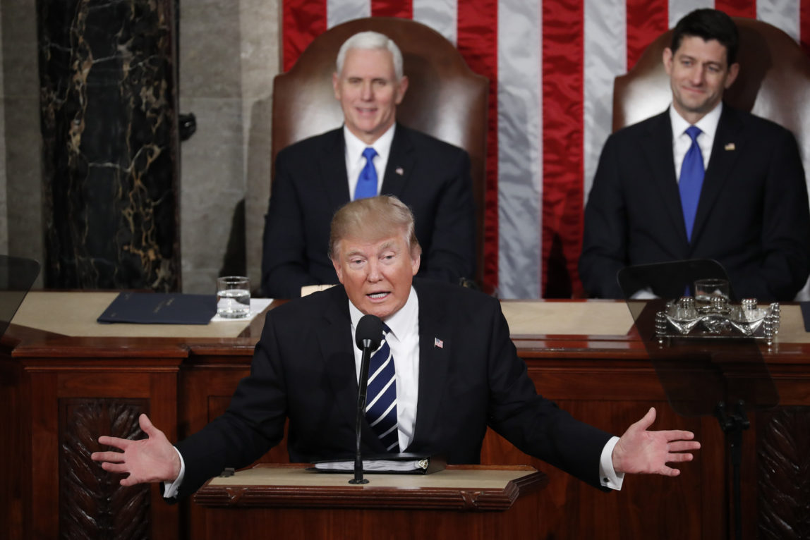 President Donald Trump addresses a joint session of Congress on Capitol Hill in Washington, Tuesday, Feb. 28, 2017, as Vice President Mike Pence and House Speaker Paul Ryan of Wis. listen. (AP Photo/Pablo Martinez Monsivais)