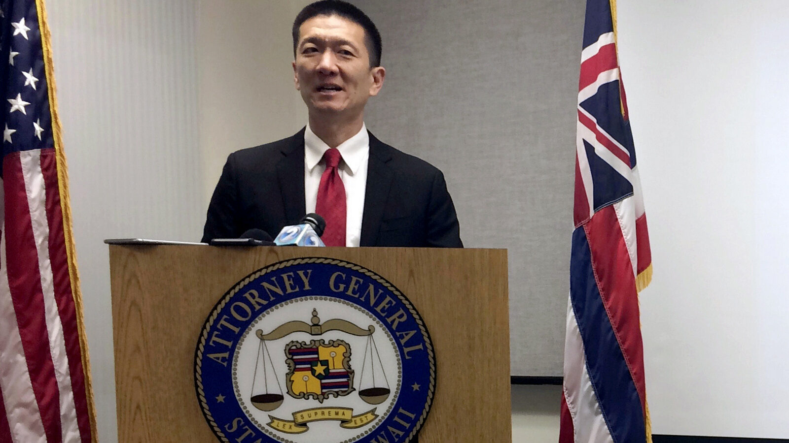 Hawaii Attorney General Doug Chin speaks at a news conference in Honolulu announcing the state of Hawaii has filed a lawsuit challenging President Donald Trump's revised travel ban. Feb. 3, 2017, (AP/Audrey McAvoy)