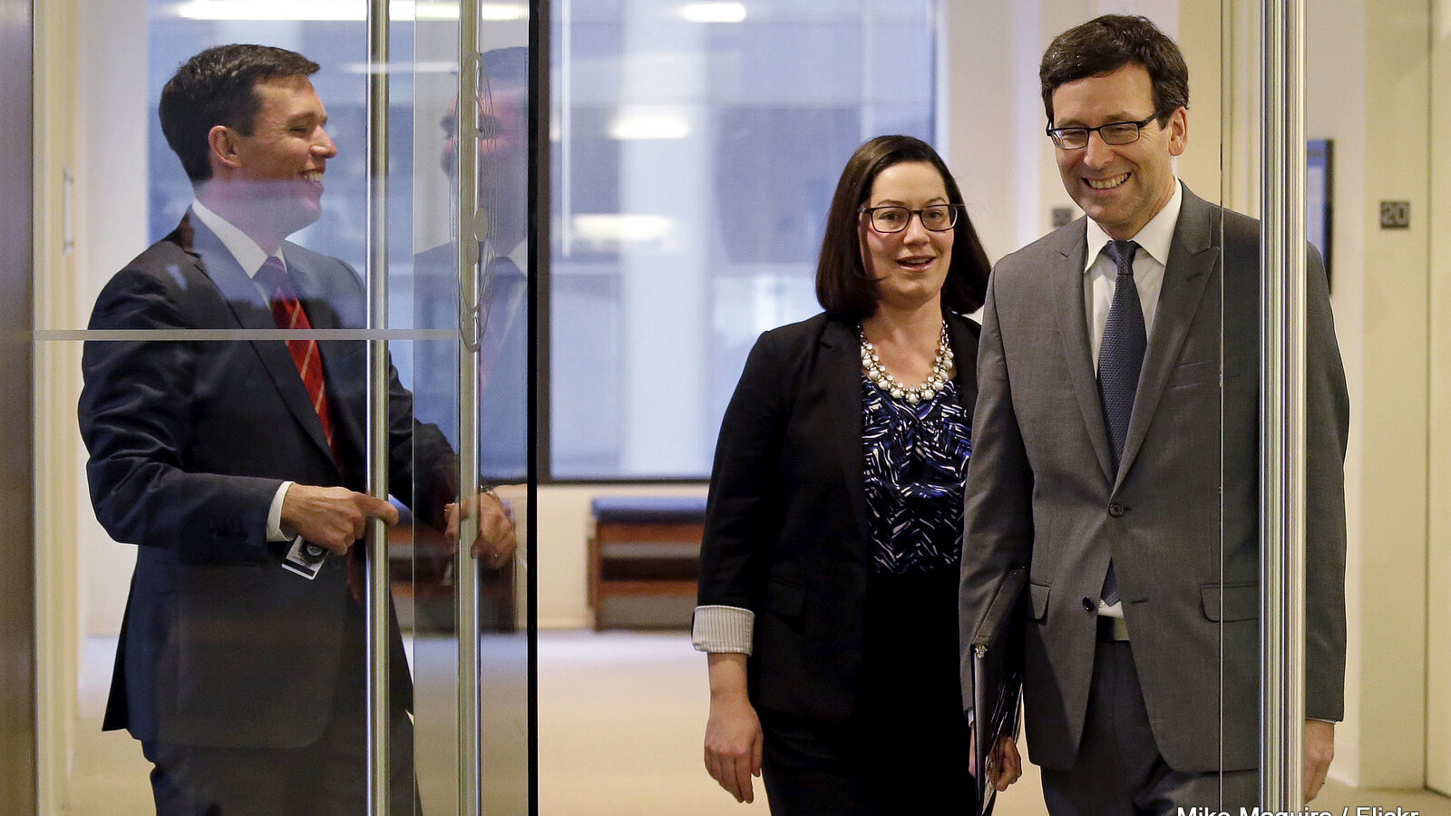 Washington State Attorney General Bob Ferguson, right, arrives for a news conference about the state's response to President Trump's revised travel ban with Solicitor General Noah Purcell, left, and Civil Rights Unit Chief Colleen Melody, Thursday, March 9, 2017, in Seattle. (AP/Elaine Thompson)