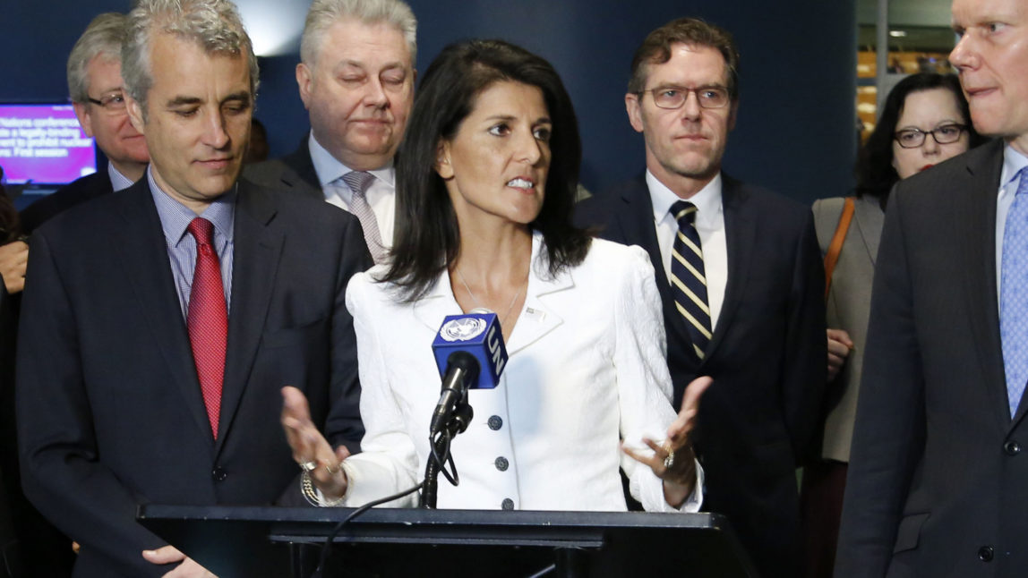 United States Ambassador to the United Nations Nikki Haley, center, speaks to reporters outside the General Assembly at U.N. headquarters, Monday, March 27, 2017. (AP/Seth Wenig)