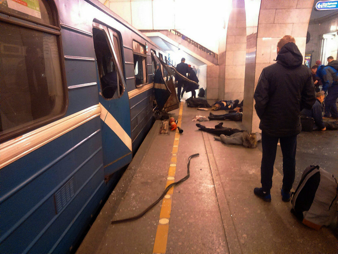 Blast victims lie near a subway train hit by a explosion at the Tekhnologichesky Institut subway station in St.Petersburg, Russia, Monday, April 3, 2017. The subway in the Russian city of St. Petersburg is reporting that several people have been injured in an explosion on a subway train. (AP Photo)