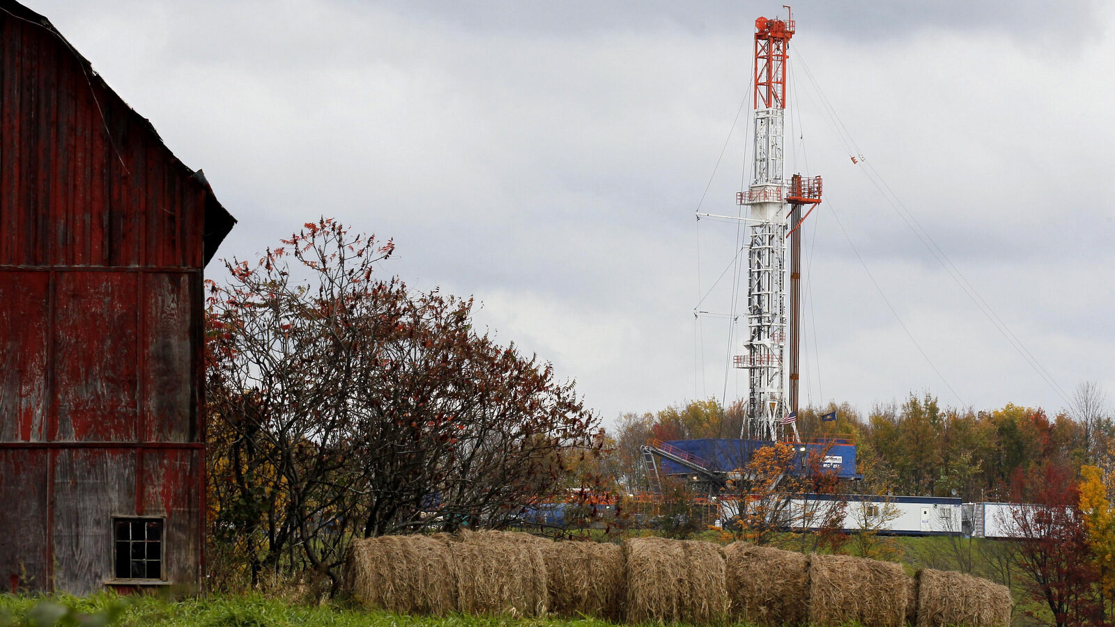 A drilling rig is set up near a barn in Springville, Pa., to tap gas from the giant Marcellus Shale gas field. (AP/Alex Brandon)