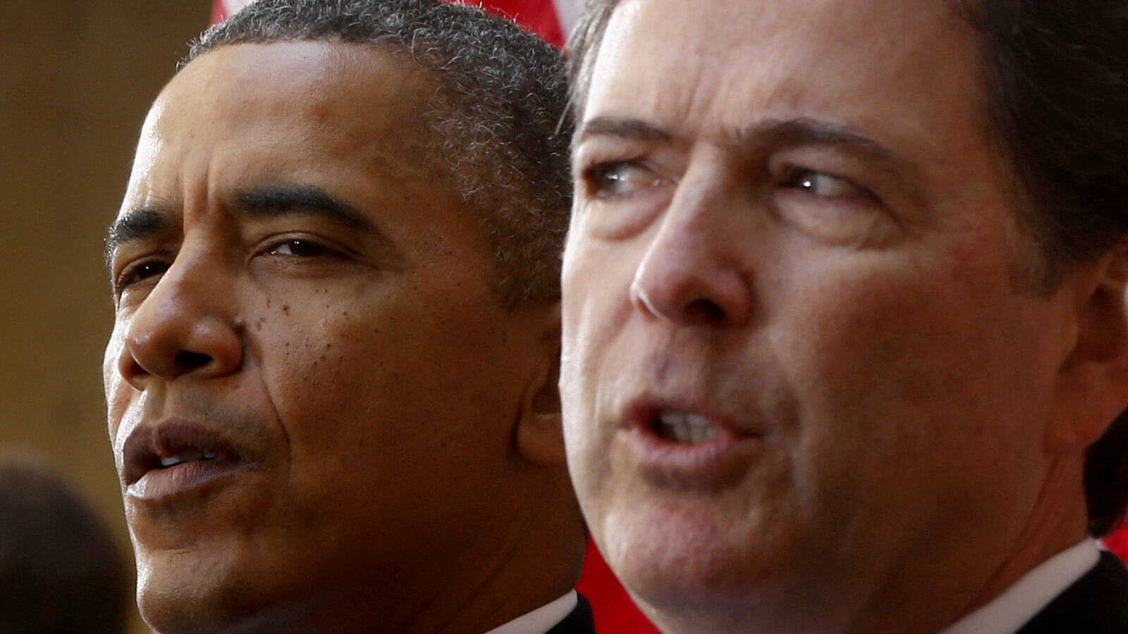 In this Oct. 28, 2013 photo, President Barack Obama and FBI Director James Comey participate in the installation ceremony for Comey as FBI director, at FBI Headquarters in Washington. (AP/Charles Dharapak)