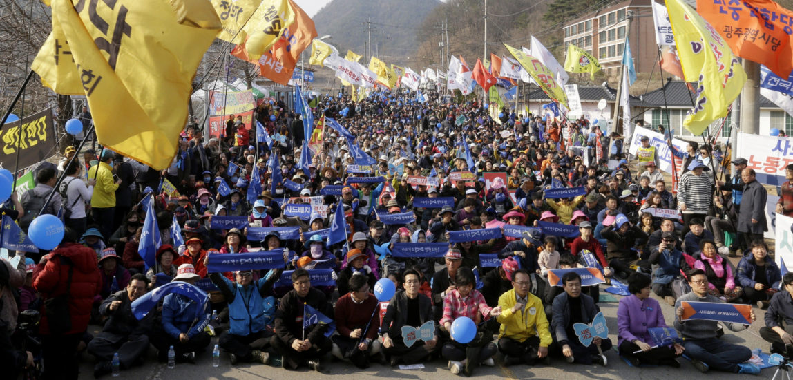Protesters stage a rally to oppose a plan to deploy an advanced U.S. missile defense system called Terminal High-Altitude Area Defense, or THAAD, in Seongju, where the THAAD will be deployed, South Korea, March 18, 2017. (AP/Ahn Young-joon)