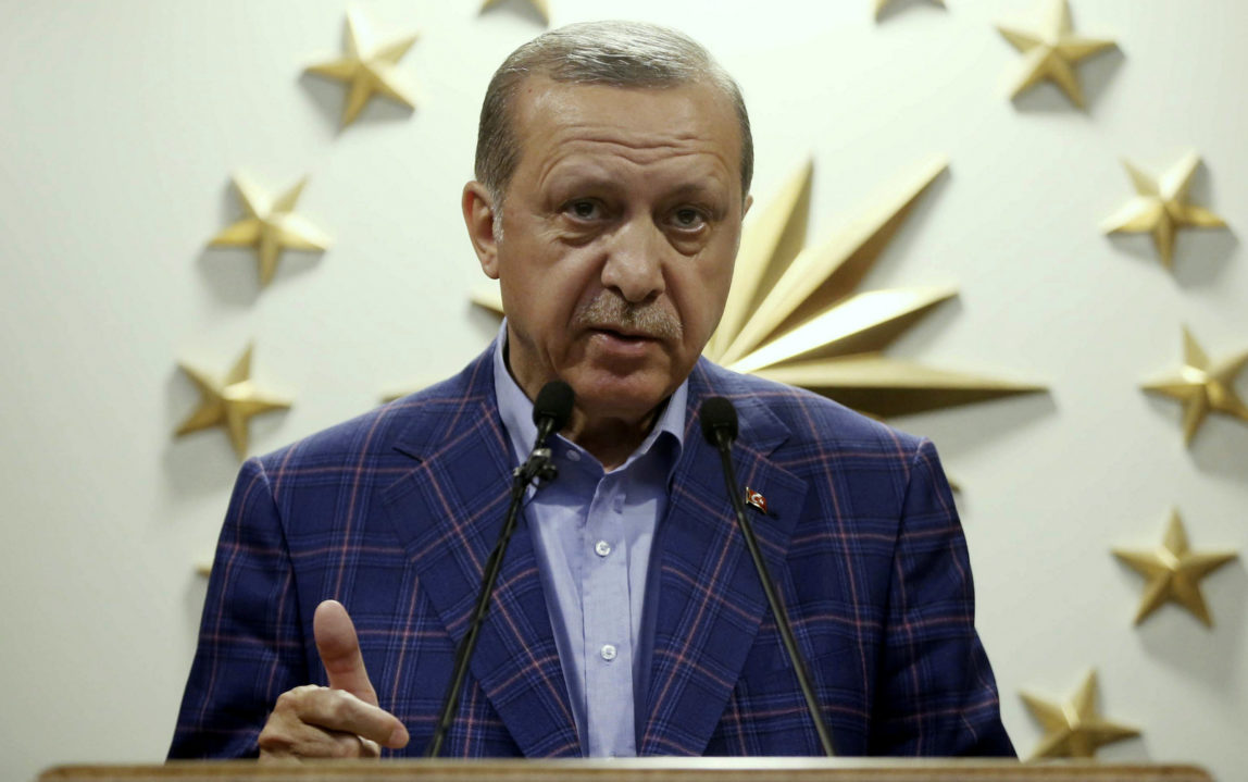 Turkey's President Recep Tayyip Erdogan speaks to the media after unofficial referendum results were announced, in Istanbul, late Sunday, April 16, 2017. (Yasin Bulbul/AP)