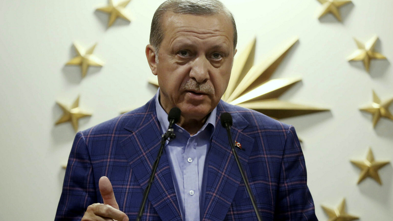 Turkey's President Recep Tayyip Erdogan speaks to the media after unofficial referendum results were announced, in Istanbul, late Sunday, April 16, 2017. (Yasin Bulbul/AP)