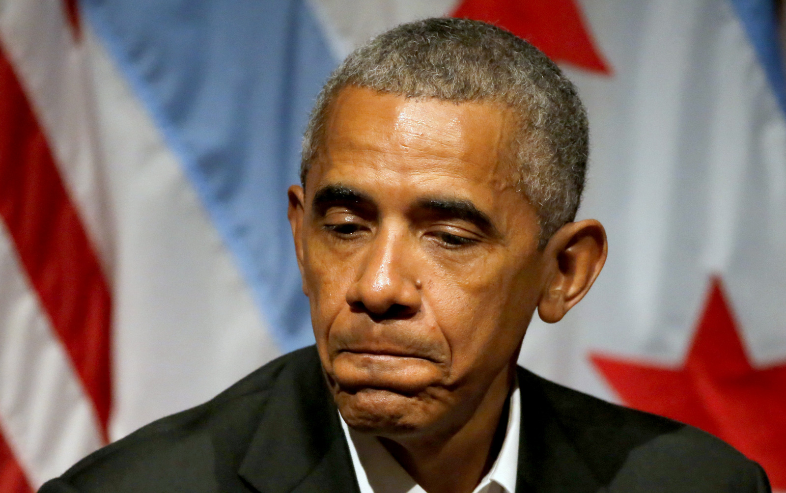 Former President Barack Obama pauses as he hosts a conversation on civic engagement and community organizing, April 24, 2017, at the University of Chicago. (AP/Charles Rex Arbogast)