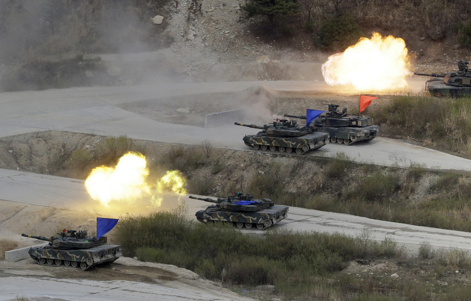 In this April 21, 2017 photo, South Korean and U.S. Army's tanks fire during a South Korea-U.S. joint military live-fire drill at Seungjin Fire Training Field in Pocheon, South Korea, near the border with the North Korea. (AP/Ahn Young-joon)
