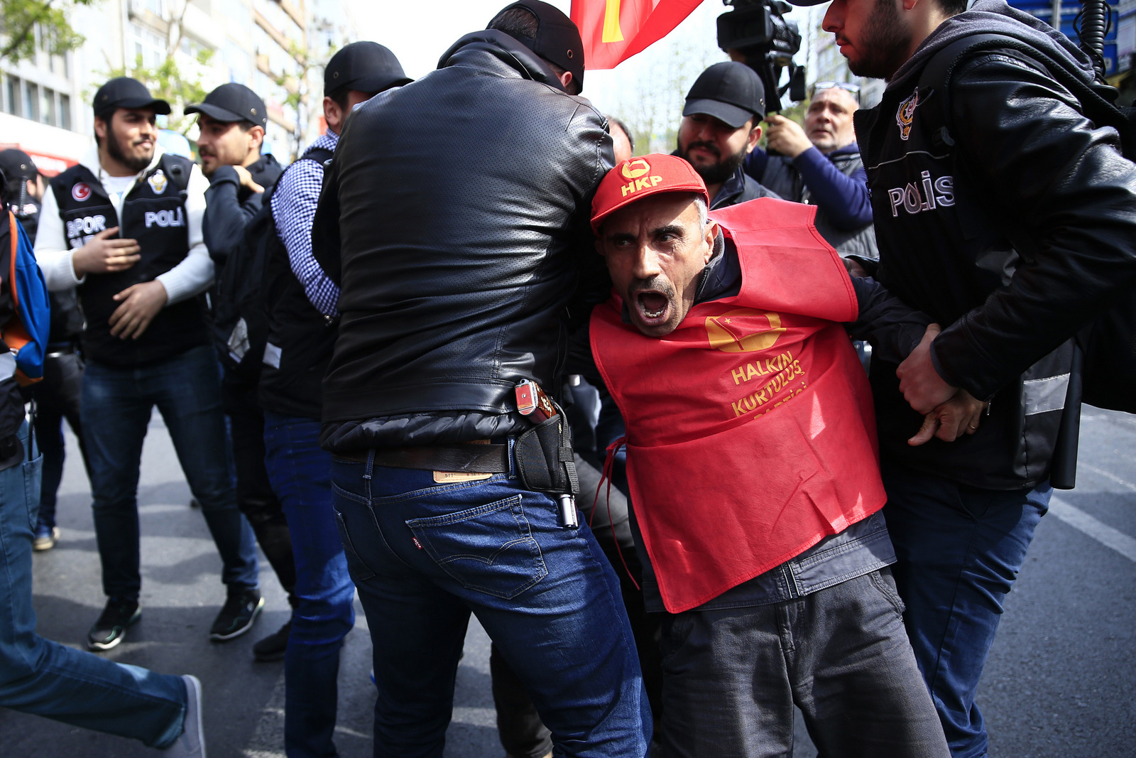 Police arrest demonstrators as they march during May Day, in Istanbul, Monday, May 1, 2017. Security forces prevented leftist groups trying to reach city's iconic Taksim Square to celebrate May Day.