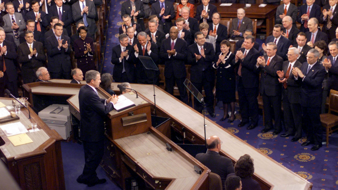 President Bush gives his State of the Union address on Capitol Hill Tuesday, Jan. 29, 2002. Bush fleshed out his vision for the war on terrorism beyond Afghanistan, to a dozen countries that he said harbor terrorists and "an axis of evil" of three more that seek weapons of mass destruction, including Syria. (AP/J.Scott Applewhite)