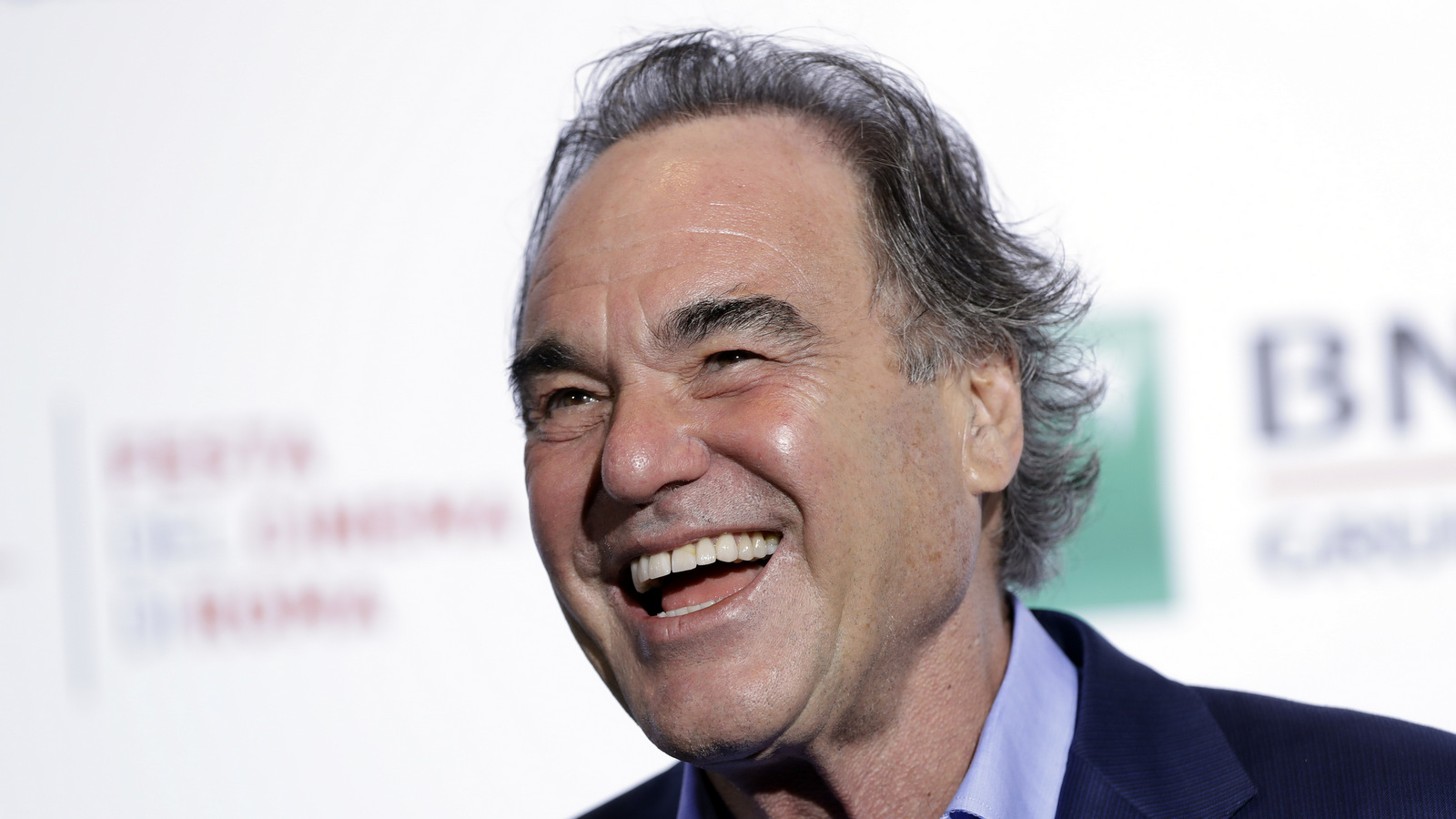 Director Oliver Stone poses for photographers during the photo call of the film "Snowden", at the Rome Film Festival. Oct. 14, 2016. (AP/Andrew Medichini)