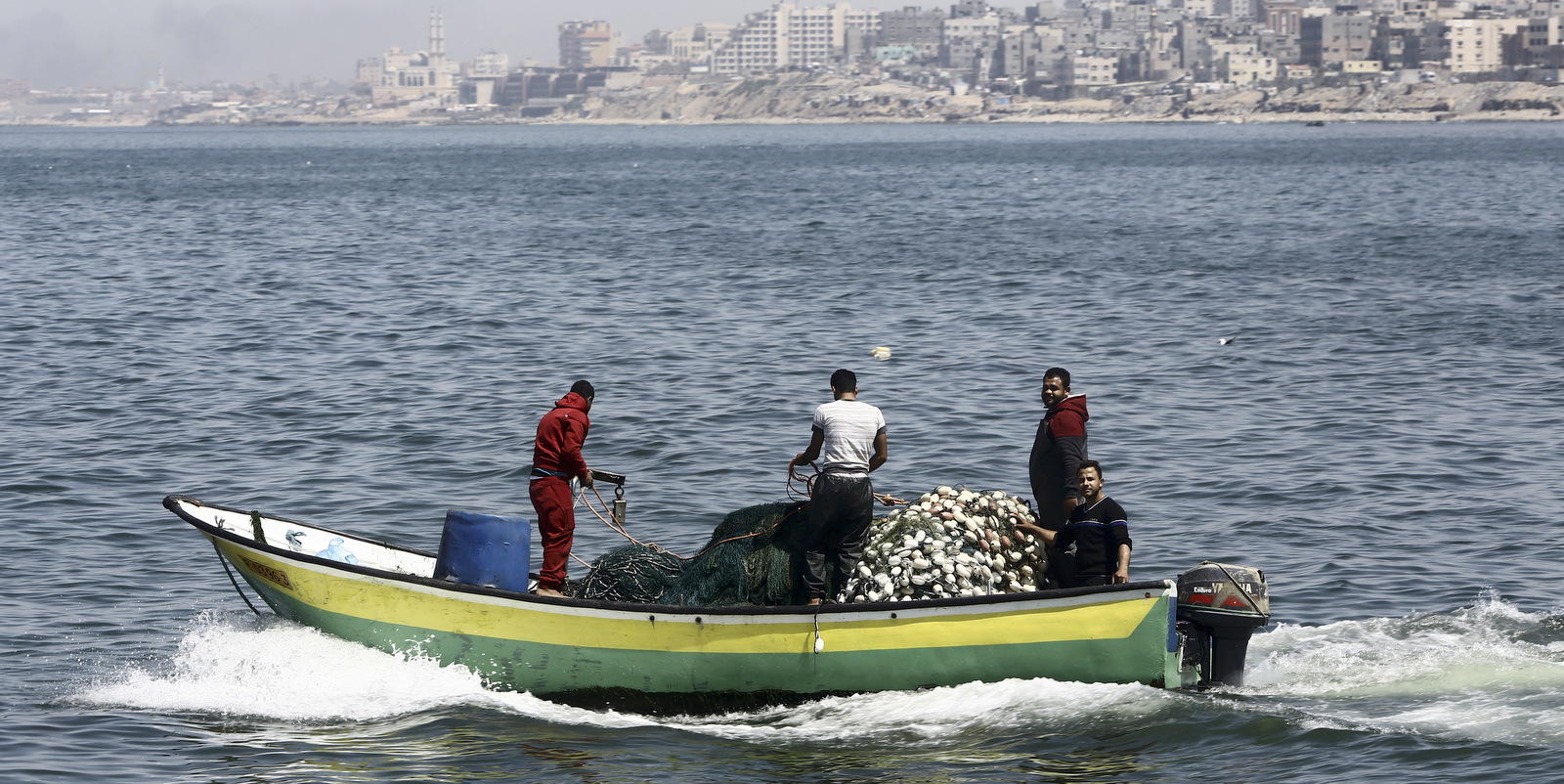 Fishermen ride their boat into the waters of the Mediterranean Sea near Gaza City, April 6, 2017. (AP/Adel Hana)