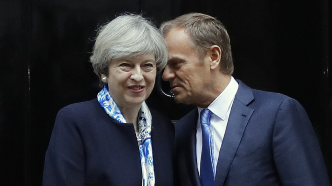 Britain's Prime Minister Theresa May speaks with Donald Tusk, President of the EU Council on the doorstep of 10 Downing Street in London. (AP/Frank Augstein)