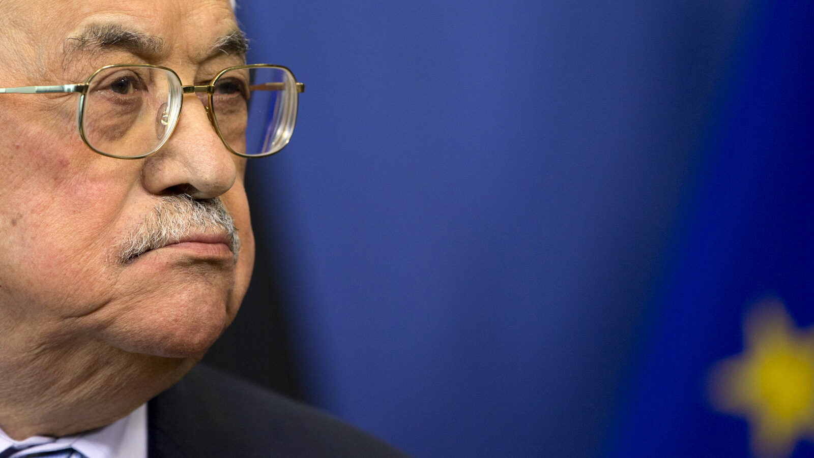 Palestinian President Mahmoud Abbas listens during a media conference at EU headquarters in Brussels, Belgium. Abbas wants peace talks with Israel without any preconditions at all, as soon as possible. (AP/Virginia Mayo)